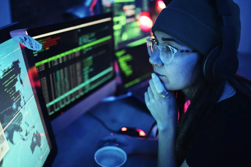 woman-computer-and-hacker-with-music-headphones-and-programming-for-cybersecurity-thinking-radio